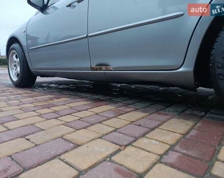 Серый Мазда 6, объемом двигателя 2 л и пробегом 302 тыс. км за 3800 $, фото 2 на Automoto.ua