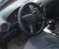 Серый Мазда 6, объемом двигателя 2 л и пробегом 200 тыс. км за 5000 $, фото 1 на Automoto.ua