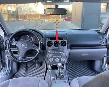 Серый Мазда 6, объемом двигателя 2 л и пробегом 240 тыс. км за 4600 $, фото 1 на Automoto.ua