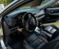 Серый Мазда 6, объемом двигателя 1.8 л и пробегом 380 тыс. км за 2800 $, фото 1 на Automoto.ua