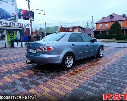Серый Мазда 6, объемом двигателя 2 л и пробегом 302 тыс. км за 3800 $, фото 2 на Automoto.ua