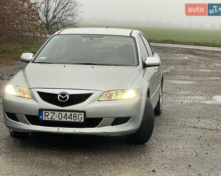 Серый Мазда 6, объемом двигателя 2 л и пробегом 293 тыс. км за 1800 $, фото 4 на Automoto.ua