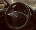 Серый Мазда 6, объемом двигателя 1.8 л и пробегом 210 тыс. км за 3300 $, фото 1 на Automoto.ua