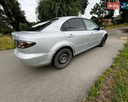 Серый Мазда 6, объемом двигателя 2 л и пробегом 275 тыс. км за 3800 $, фото 6 на Automoto.ua