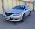 Серый Мазда 6, объемом двигателя 2 л и пробегом 246 тыс. км за 3500 $, фото 1 на Automoto.ua
