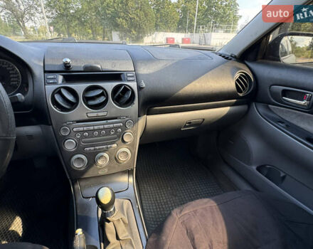 Серый Мазда 6, объемом двигателя 2 л и пробегом 331 тыс. км за 2250 $, фото 12 на Automoto.ua