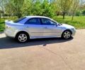 Серый Мазда 6, объемом двигателя 2 л и пробегом 271 тыс. км за 4100 $, фото 1 на Automoto.ua
