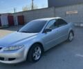 Серый Мазда 6, объемом двигателя 2 л и пробегом 265 тыс. км за 2310 $, фото 1 на Automoto.ua