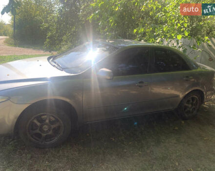 Серый Мазда 6, объемом двигателя 2 л и пробегом 365 тыс. км за 5500 $, фото 1 на Automoto.ua
