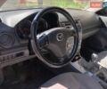 Серый Мазда 6, объемом двигателя 1.8 л и пробегом 298 тыс. км за 4200 $, фото 4 на Automoto.ua