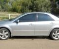 Серый Мазда 6, объемом двигателя 2 л и пробегом 206 тыс. км за 3650 $, фото 2 на Automoto.ua