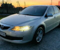 Серый Мазда 6, объемом двигателя 2 л и пробегом 310 тыс. км за 4250 $, фото 1 на Automoto.ua
