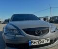 Серый Мазда 6, объемом двигателя 2 л и пробегом 526 тыс. км за 5500 $, фото 1 на Automoto.ua