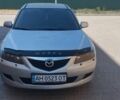 Серый Мазда 6, объемом двигателя 2 л и пробегом 295 тыс. км за 4000 $, фото 1 на Automoto.ua