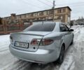 Сірий Мазда 6, об'ємом двигуна 2 л та пробігом 318 тис. км за 3999 $, фото 1 на Automoto.ua