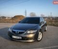 Серый Мазда 6, объемом двигателя 1.8 л и пробегом 225 тыс. км за 3899 $, фото 1 на Automoto.ua