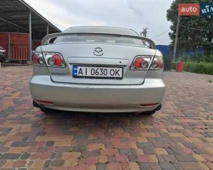Серый Мазда 6, объемом двигателя 2 л и пробегом 450 тыс. км за 3000 $, фото 3 на Automoto.ua
