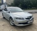 Серый Мазда 6, объемом двигателя 1.8 л и пробегом 255 тыс. км за 3800 $, фото 1 на Automoto.ua