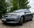 Серый Мазда 6, объемом двигателя 1.8 л и пробегом 221 тыс. км за 3700 $, фото 1 на Automoto.ua