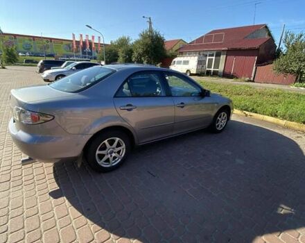 Серый Мазда 6, объемом двигателя 2 л и пробегом 301 тыс. км за 4100 $, фото 3 на Automoto.ua
