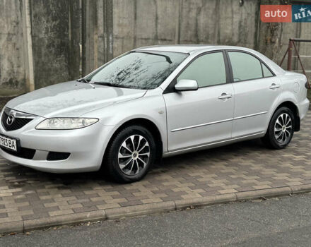 Серый Мазда 6, объемом двигателя 1.8 л и пробегом 302 тыс. км за 3800 $, фото 1 на Automoto.ua