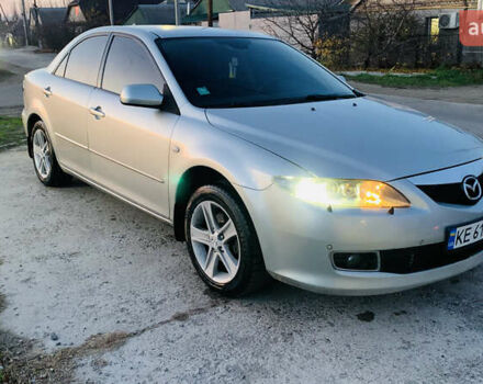 Серый Мазда 6, объемом двигателя 2 л и пробегом 310 тыс. км за 4250 $, фото 1 на Automoto.ua