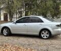 Серый Мазда 6, объемом двигателя 2 л и пробегом 250 тыс. км за 4500 $, фото 2 на Automoto.ua
