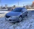 Серый Мазда 6, объемом двигателя 2 л и пробегом 230 тыс. км за 4999 $, фото 1 на Automoto.ua