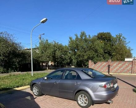 Серый Мазда 6, объемом двигателя 2 л и пробегом 301 тыс. км за 4100 $, фото 2 на Automoto.ua