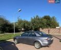 Серый Мазда 6, объемом двигателя 2 л и пробегом 301 тыс. км за 4100 $, фото 2 на Automoto.ua