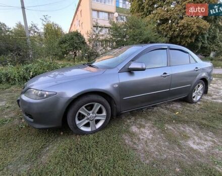 Серый Мазда 6, объемом двигателя 2 л и пробегом 260 тыс. км за 6000 $, фото 2 на Automoto.ua