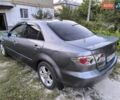 Серый Мазда 6, объемом двигателя 2 л и пробегом 260 тыс. км за 6000 $, фото 1 на Automoto.ua