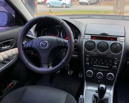 Мазда 6 2006 у Черкасах на Automoto.ua Сірий Мазда 6, об'ємом двигуна 2 л та пробігом 269 тис. км за 4900 $, фото 7 на Automoto.ua