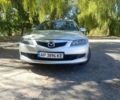 Серый Мазда 6, объемом двигателя 2 л и пробегом 210 тыс. км за 6000 $, фото 1 на Automoto.ua
