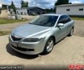 Серый Мазда 6, объемом двигателя 1.8 л и пробегом 253 тыс. км за 2800 $, фото 1 на Automoto.ua