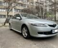 Серый Мазда 6, объемом двигателя 2 л и пробегом 307 тыс. км за 4600 $, фото 1 на Automoto.ua