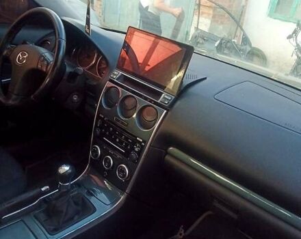 Серый Мазда 6, объемом двигателя 2 л и пробегом 189 тыс. км за 2000 $, фото 5 на Automoto.ua