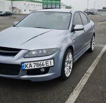 Серый Мазда 6, объемом двигателя 2.3 л и пробегом 254 тыс. км за 6350 $, фото 1 на Automoto.ua