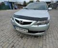 Серый Мазда 6, объемом двигателя 2 л и пробегом 212 тыс. км за 5800 $, фото 1 на Automoto.ua