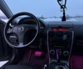 Серый Мазда 6, объемом двигателя 2 л и пробегом 318 тыс. км за 5500 $, фото 7 на Automoto.ua