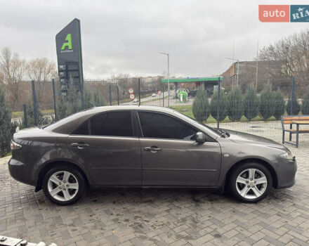 Серый Мазда 6, объемом двигателя 2 л и пробегом 160 тыс. км за 5200 $, фото 2 на Automoto.ua