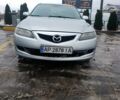 Серый Мазда 6, объемом двигателя 2 л и пробегом 265 тыс. км за 5500 $, фото 1 на Automoto.ua