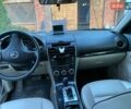 Серый Мазда 6, объемом двигателя 2 л и пробегом 288 тыс. км за 5200 $, фото 3 на Automoto.ua