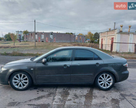 Сірий Мазда 6, об'ємом двигуна 2.3 л та пробігом 260 тис. км за 3900 $, фото 2 на Automoto.ua