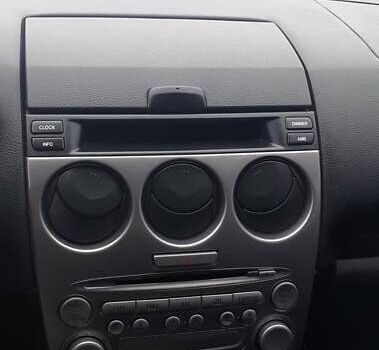 Серый Мазда 6, объемом двигателя 2 л и пробегом 254 тыс. км за 5500 $, фото 1 на Automoto.ua