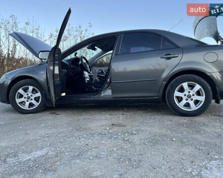 Мазда 6 2006 у Каменце-Подольском на Automoto.ua Сірий Мазда 6, об'ємом двигуна 2 л та пробігом 310 тис. км за 4300 $, фото 11 на Automoto.ua