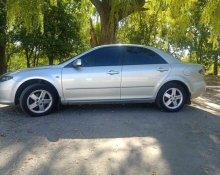 Серый Мазда 6, объемом двигателя 2 л и пробегом 210 тыс. км за 5500 $, фото 2 на Automoto.ua