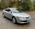 Серый Мазда 6, объемом двигателя 2 л и пробегом 245 тыс. км за 4599 $, фото 1 на Automoto.ua