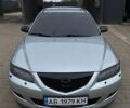 Серый Мазда 6, объемом двигателя 1.8 л и пробегом 207 тыс. км за 4999 $, фото 1 на Automoto.ua