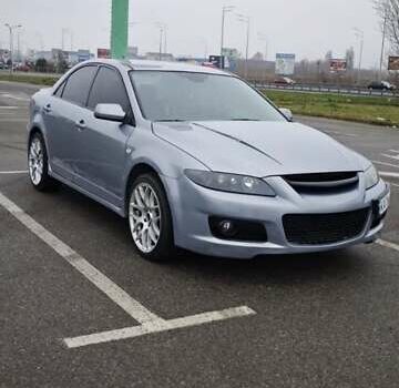 Серый Мазда 6, объемом двигателя 2.3 л и пробегом 254 тыс. км за 6350 $, фото 2 на Automoto.ua